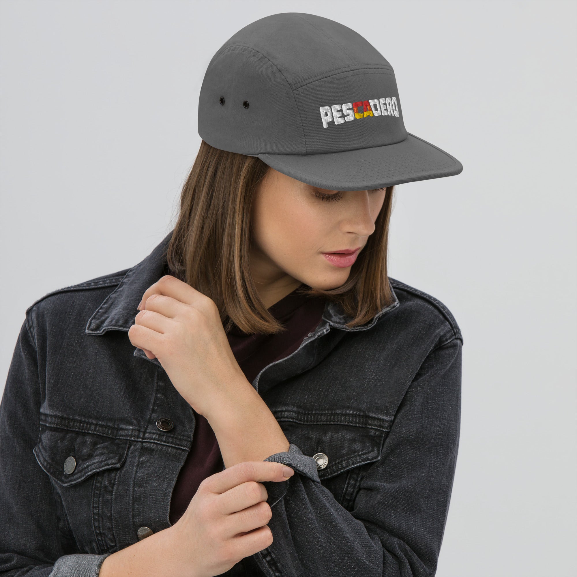 Woman wearing Pescadero Sunset embroidered camper hat