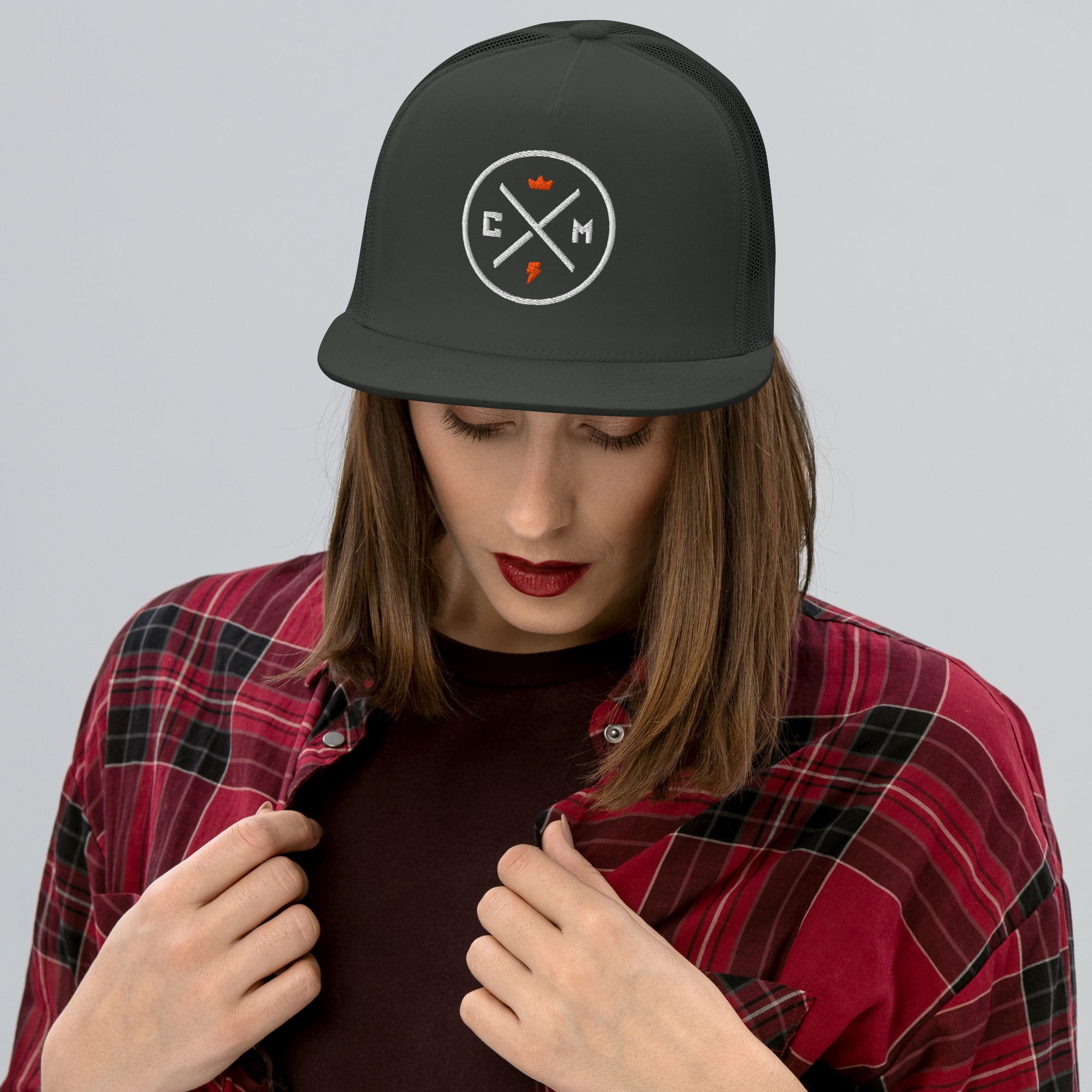 Woman wearing a Crown Moto Legend Embroidered Trucker Hat
