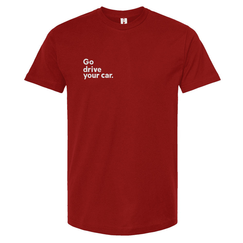 Red t-shirt with 'Go drive your car.' text on a white background