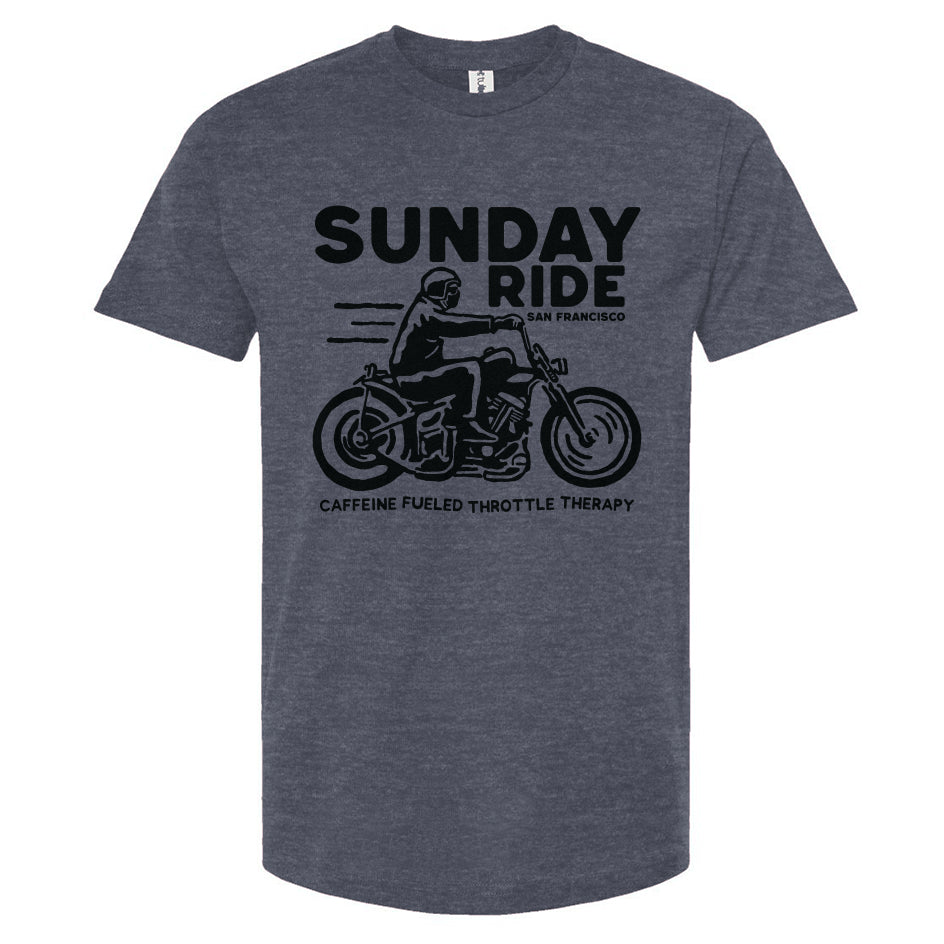 Denim blue t-shirt with black 'Sunday Ride' graphic and text on a white background