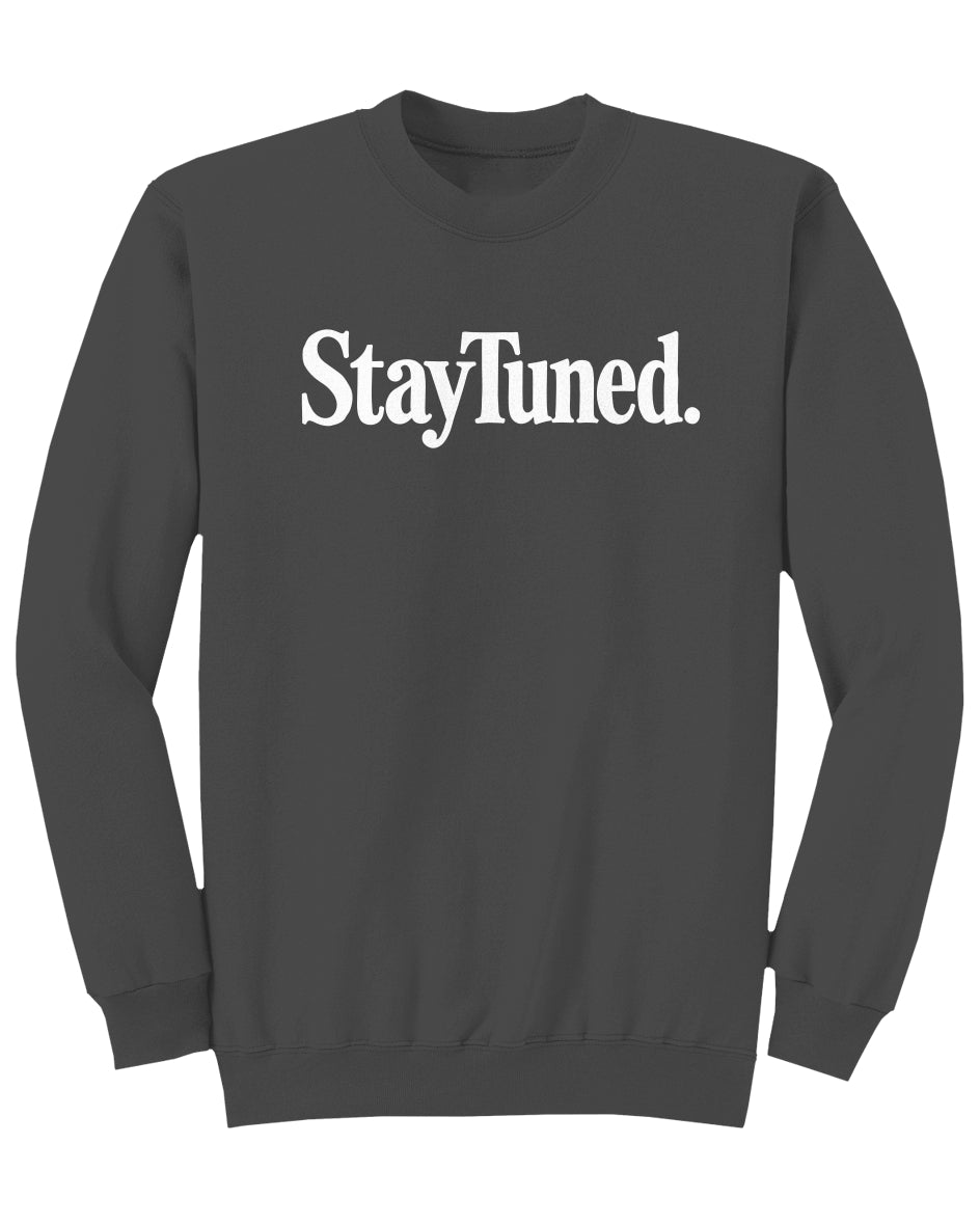 Gray sweatshirt with 'StayTuned.' text on a white background