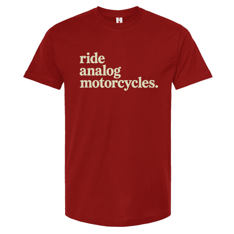 Red t-shirt with white text 'ride analog motorcycles' on a white background