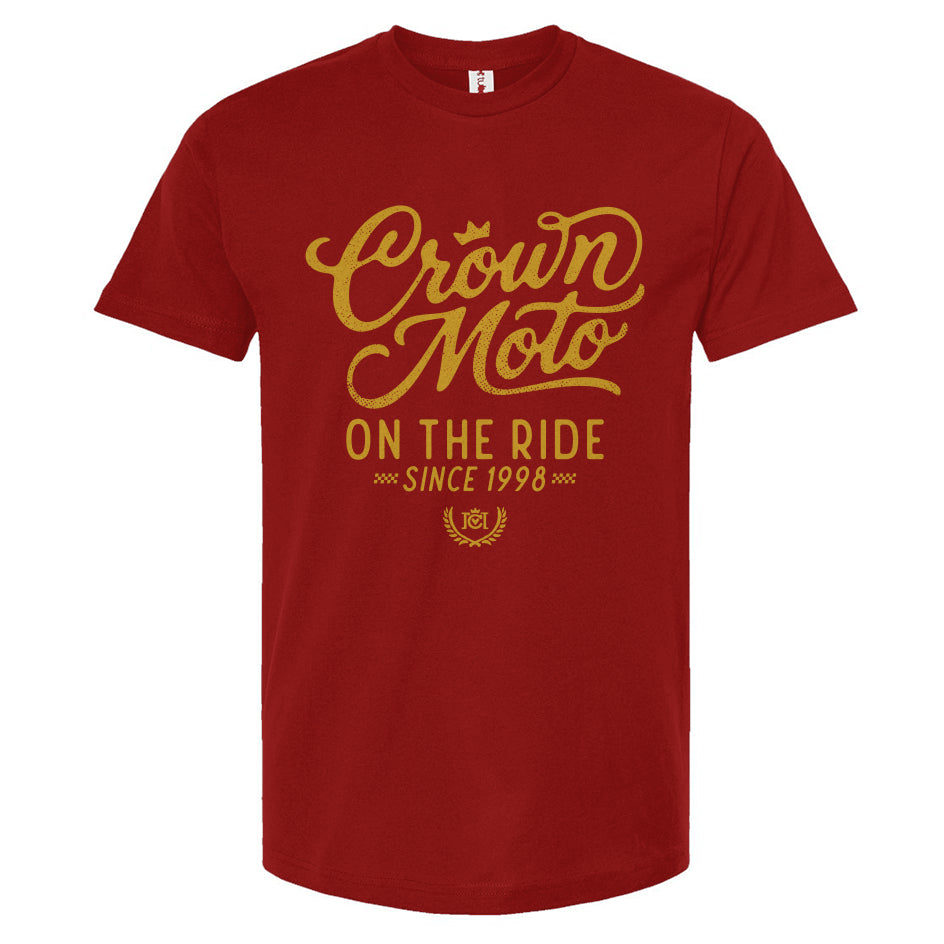 Cardinal red t-shirt with Crown Moto graphic design and text on a white background