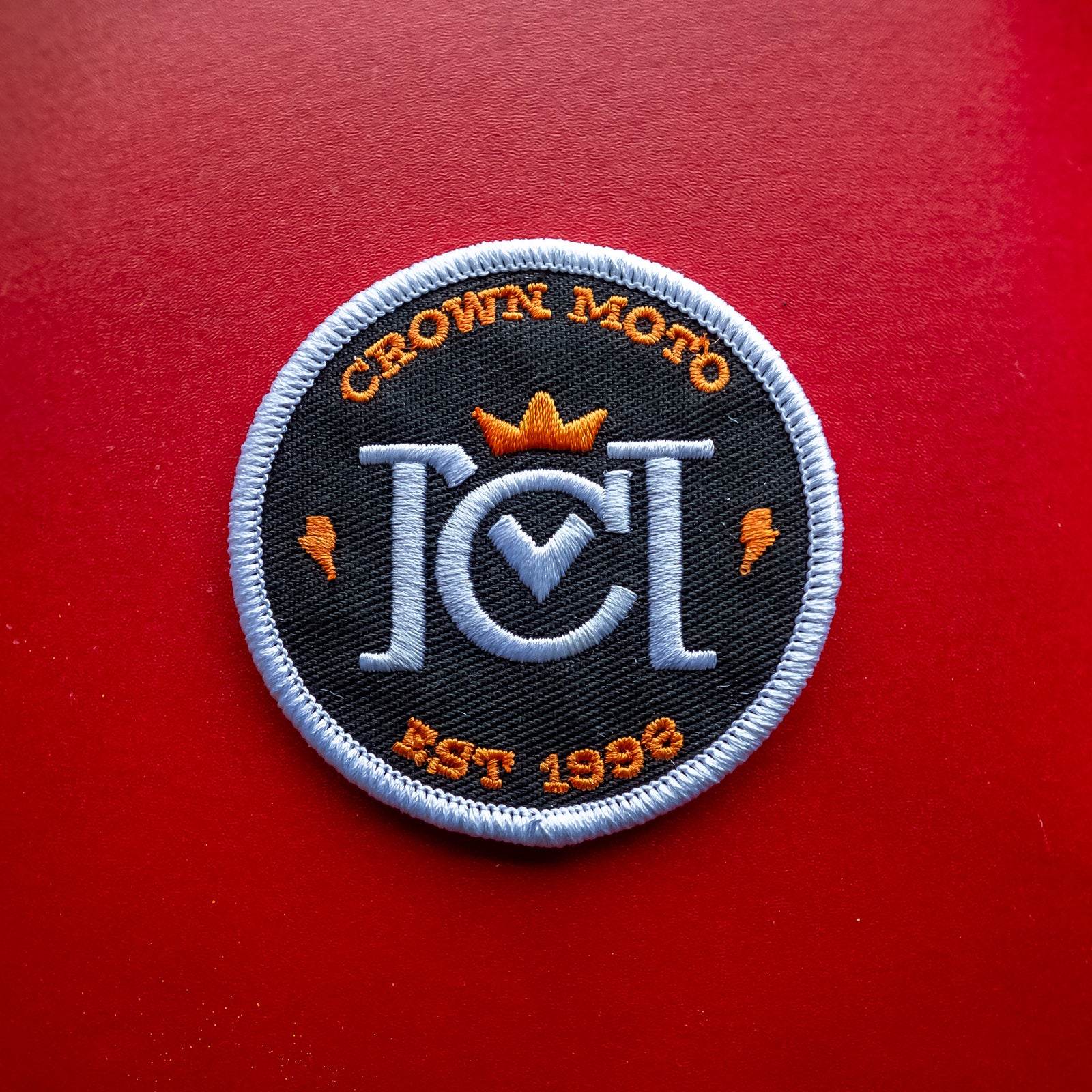 crown moto logo round embroidered patch, motorcycle lifestyle, motorbikes, embroidery, OG, crown, lightning bolts, trademarked, registered, branded, logo
