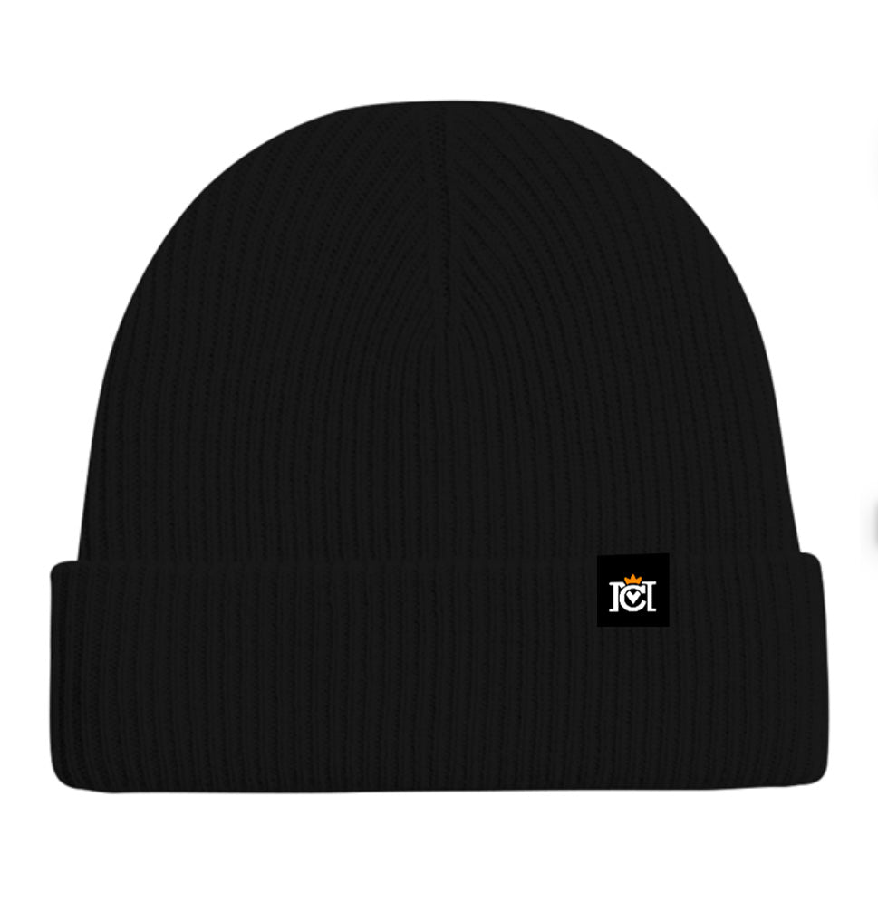 Black colored cashmere beanie with a small Crown Moto woven logo patch sewn to top cuff