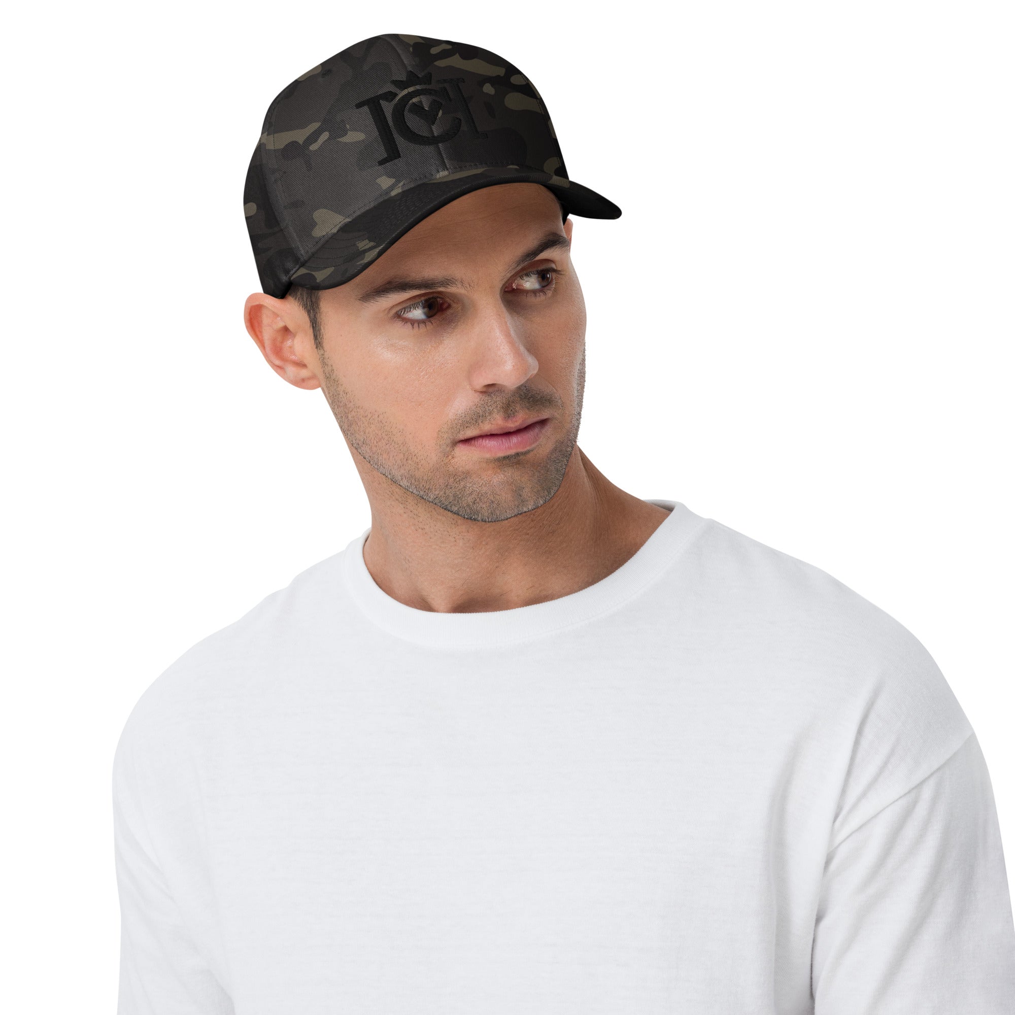 Man wearing trademarked crown moto logo embroidered in 3D puff style on front of camouflage flexfit hat