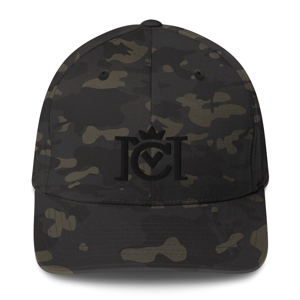 Trademarked crown moto logo embroidered in 3D puff style on front of flexfit hat