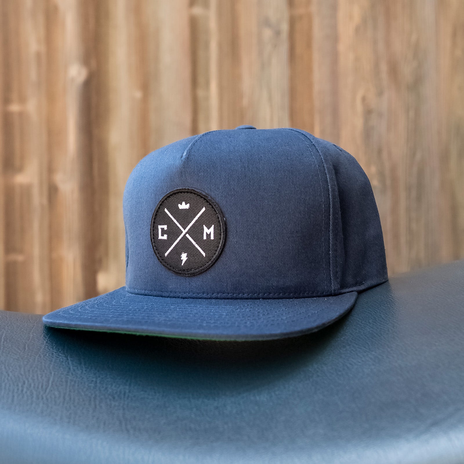 Crown Moto Legend patch on navy blue snapback hat, logo, motorcycle hats, motorcycle lifestyle, embroidered, premium quality, original