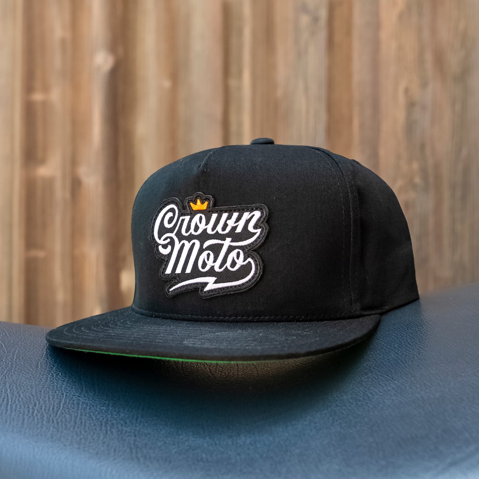 Crown Moto Script Logo patch on black snapback hat, logo, motorcycle hats, motorcycle lifestyle, embroidered, premium quality