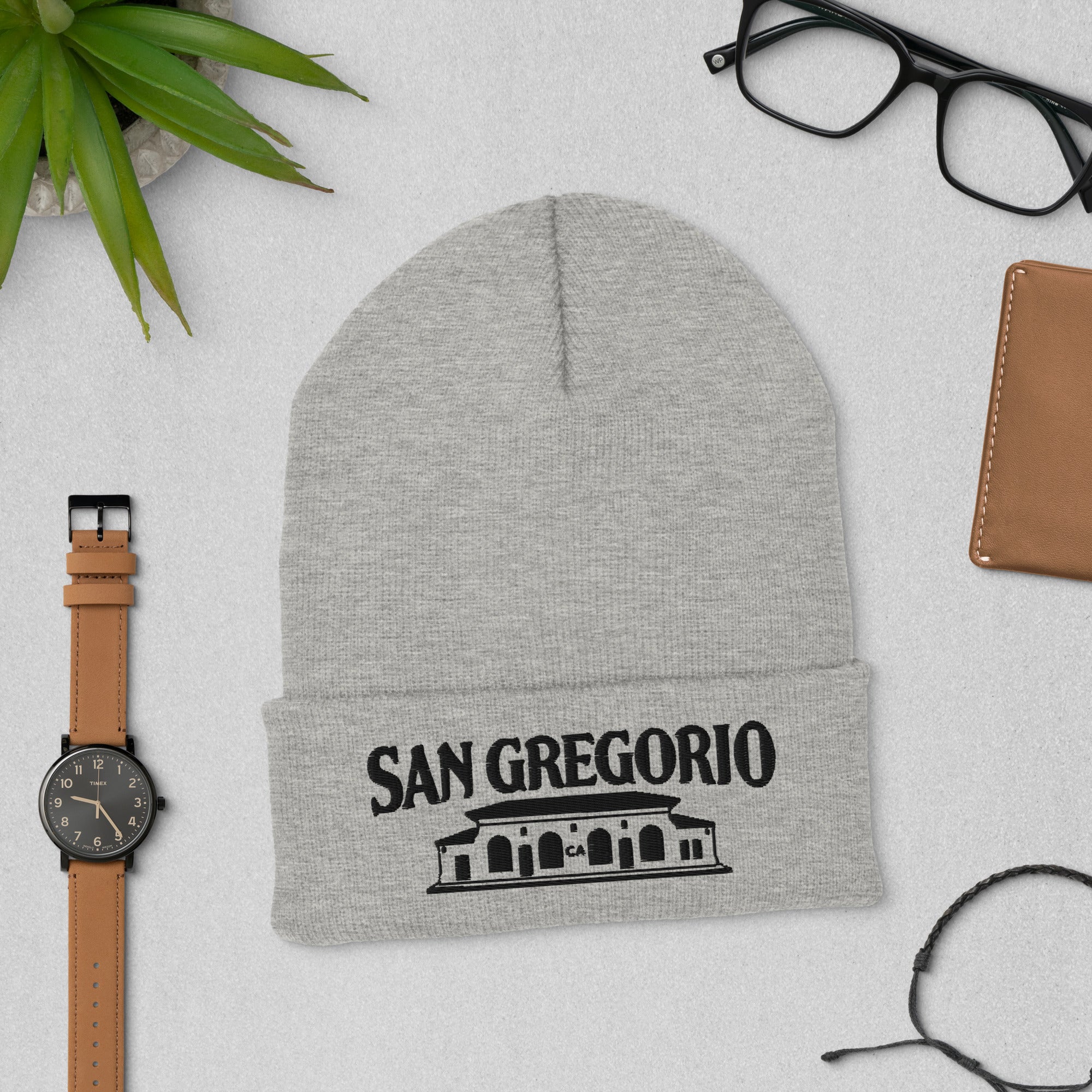Grey beanie with San Gregorio General Store design embroidered on cuff