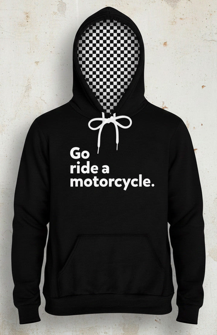 Premium Black hoodie with 'Go ride a motorcycle.' text on the chest and checkered flag lined hood on a textured background