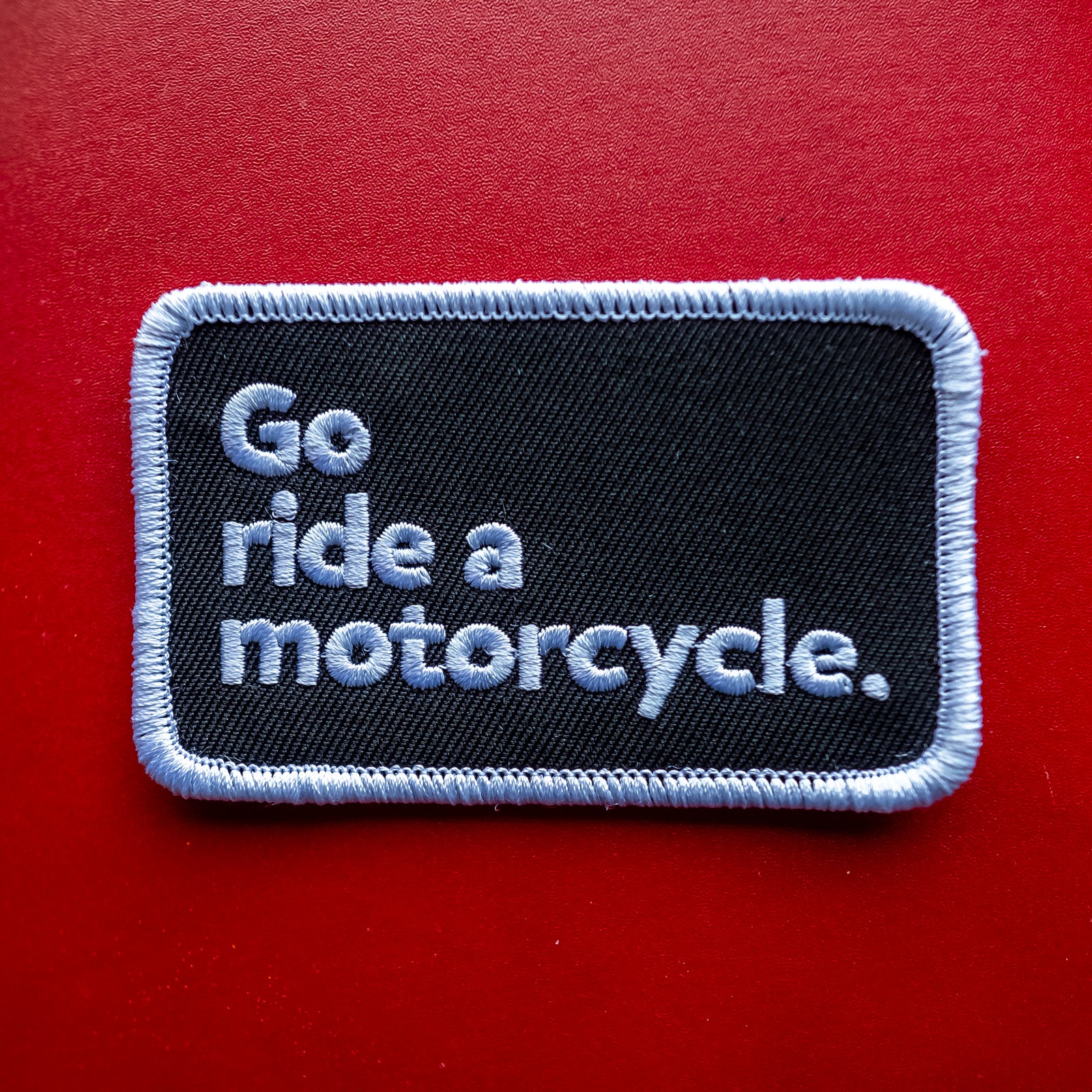 go ride a motorcycle patch, embroidered patch, loose patch, motorbikes, motorcycle lifestyle, crown moto, original, trademarked, copyrighted, merrowed edge