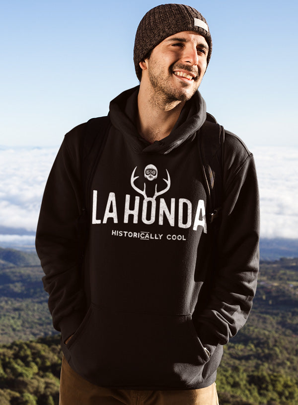 Man wearing hooded sweatshirt with La Honda 650 Moto design on chest