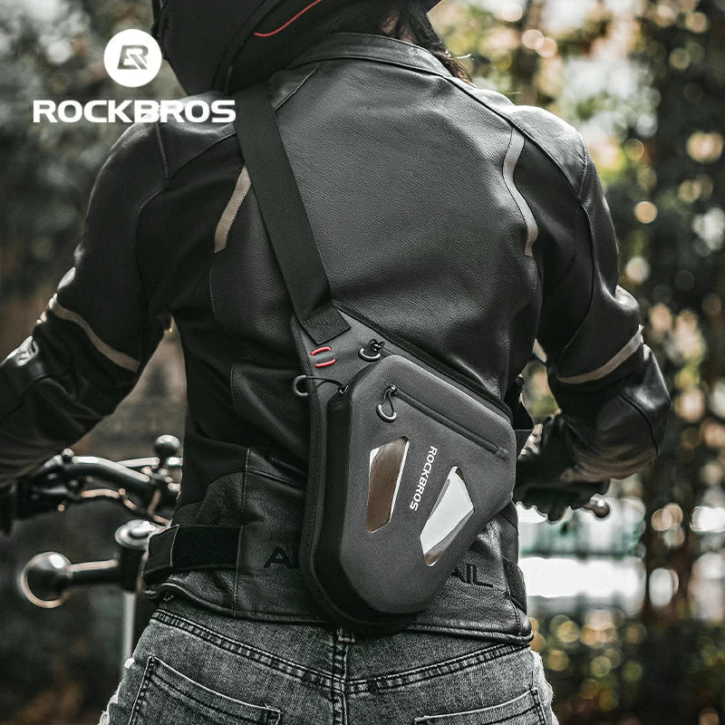 Person wearing a black motorcycle jacket with a RockBros bag on a blurred background