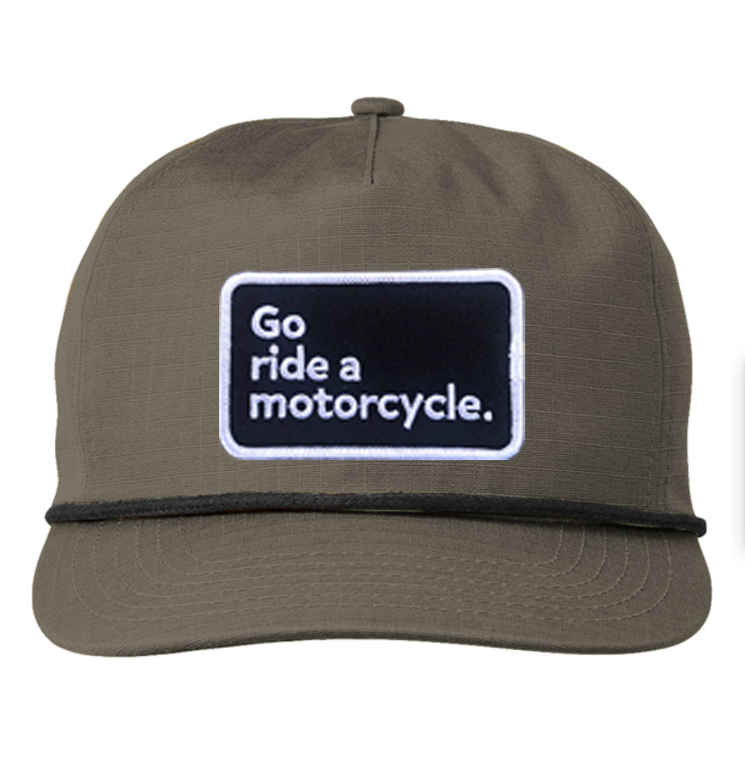 Product mockup of gold "Go ride a motorcycle" patch ripstop snapback hat by crown moto, embroidered patch, embroidery, motorcycle lifestyle, harley davidson, water resistant, lightweight, original