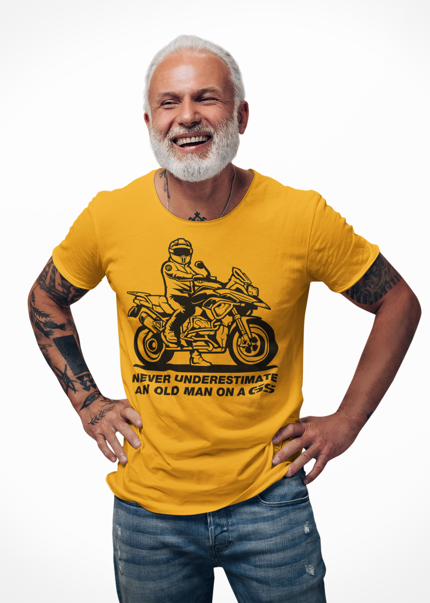 Older man wearing a t-shirt with rider on a GS motorcycle sitting proudly with text below saying "never underestimate an old man on a gs"