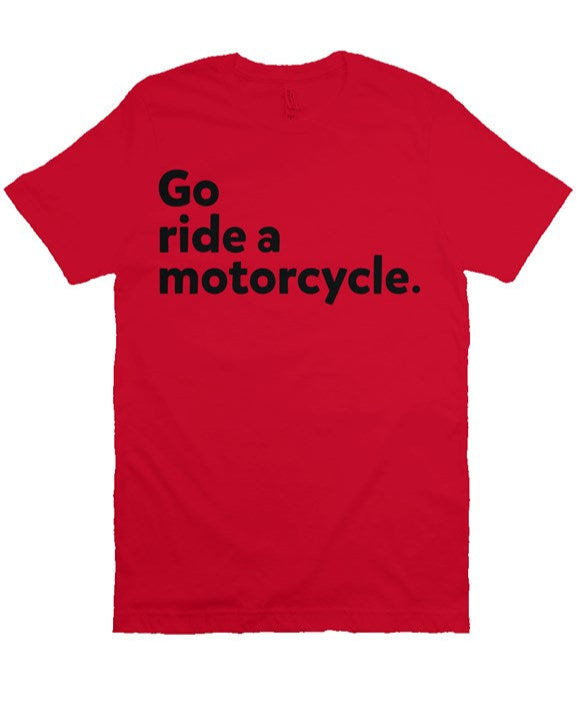 "Go ride a motorcycle" printed in vintage black ink on chest of premium unisex short sleeve t-shirt