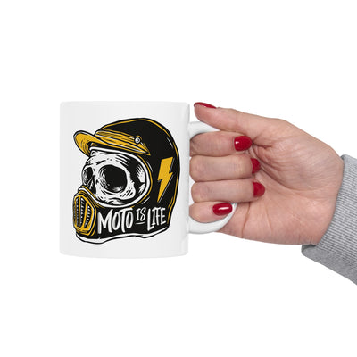 Woman holding Moto is Life white ceramic coffee mug, motorcycle lifestyle, live to ride, ride to live, skull