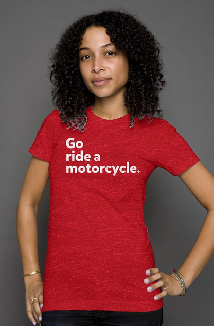 "Go ride a motorcycle" printed in white on the chest of premium short sleeve women's shirt