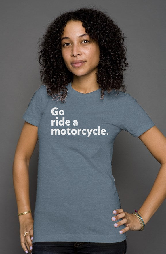 "Go ride a motorcycle" printed in white on the chest of premium short sleeve women's shirt