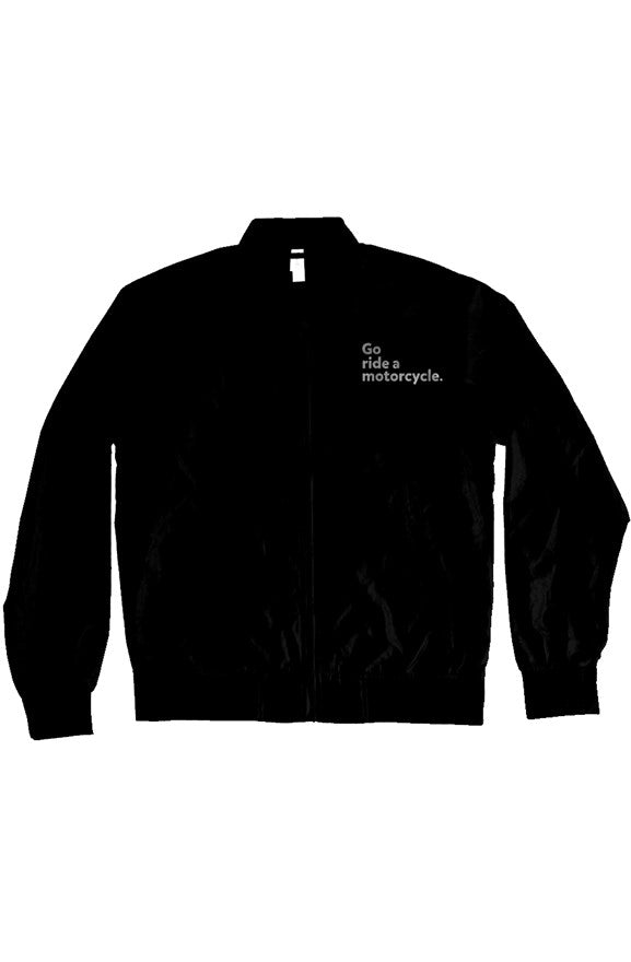 "Go ride a motorcycle" embroidered on the chest of lightweight nylon bomber jacket