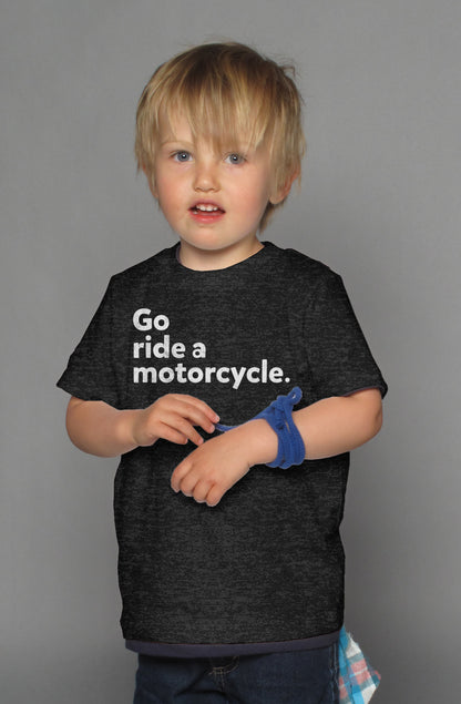 "Go ride a motorcycle" design printed in white on chest of kid's short sleeve t-shirt