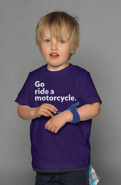 "Go ride a motorcycle" design printed in white on chest of kid's short sleeve t-shirt