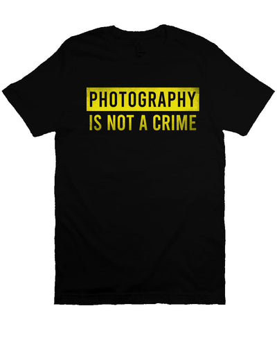 short sleeve t-shirt with "photography is not a crime" in yellow on chest