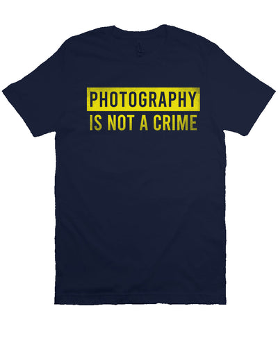 short sleeve t-shirt with "photography is not a crime" in yellow on chest