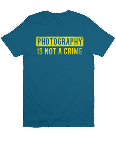 short sleeve t-shirt with "photography is not a crime" in yellow on chest