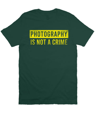 short sleeve t-shirt with "photography is not a crime" in yellow on chest