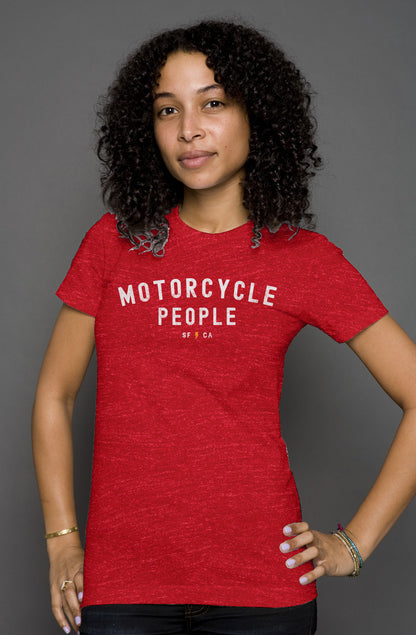 Attractive woman wearing heather short sleeve t-shirt with "motorcycle people" SF CA design on chest