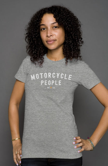 Attractive woman wearing heather short sleeve t-shirt with "motorcycle people" SF CA design on chest