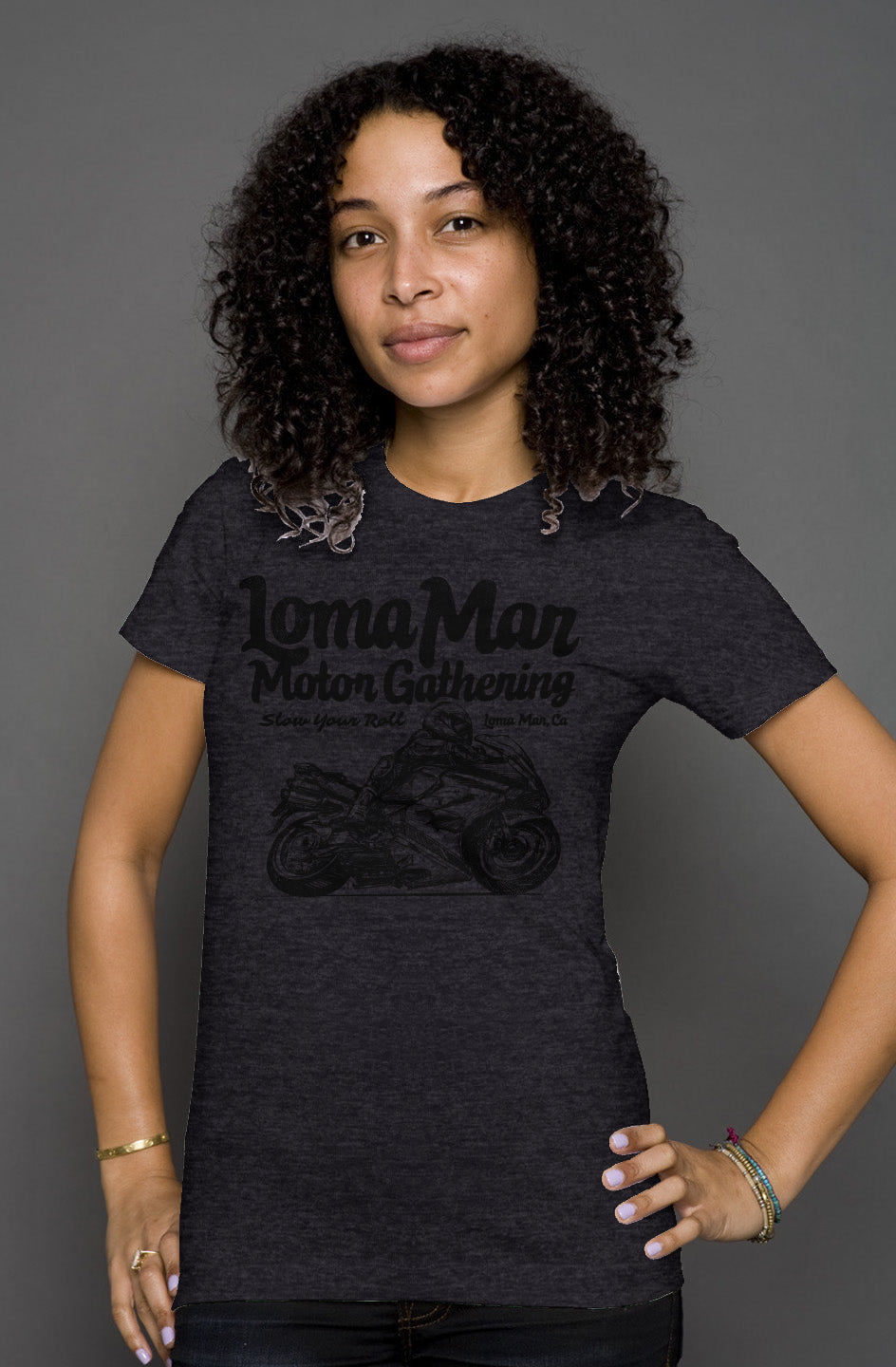 Attractive woman wearing short sleeve t-shirt with "Loma Mar Motor Gathering" moto sketch design on chest