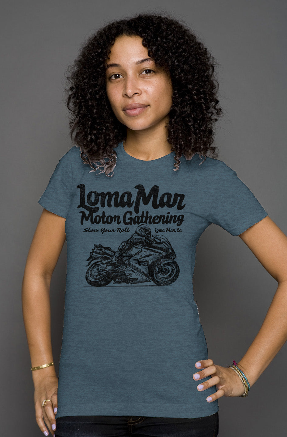 Attractive woman wearing short sleeve t-shirt with "Loma Mar Motor Gathering" moto sketch design on chest