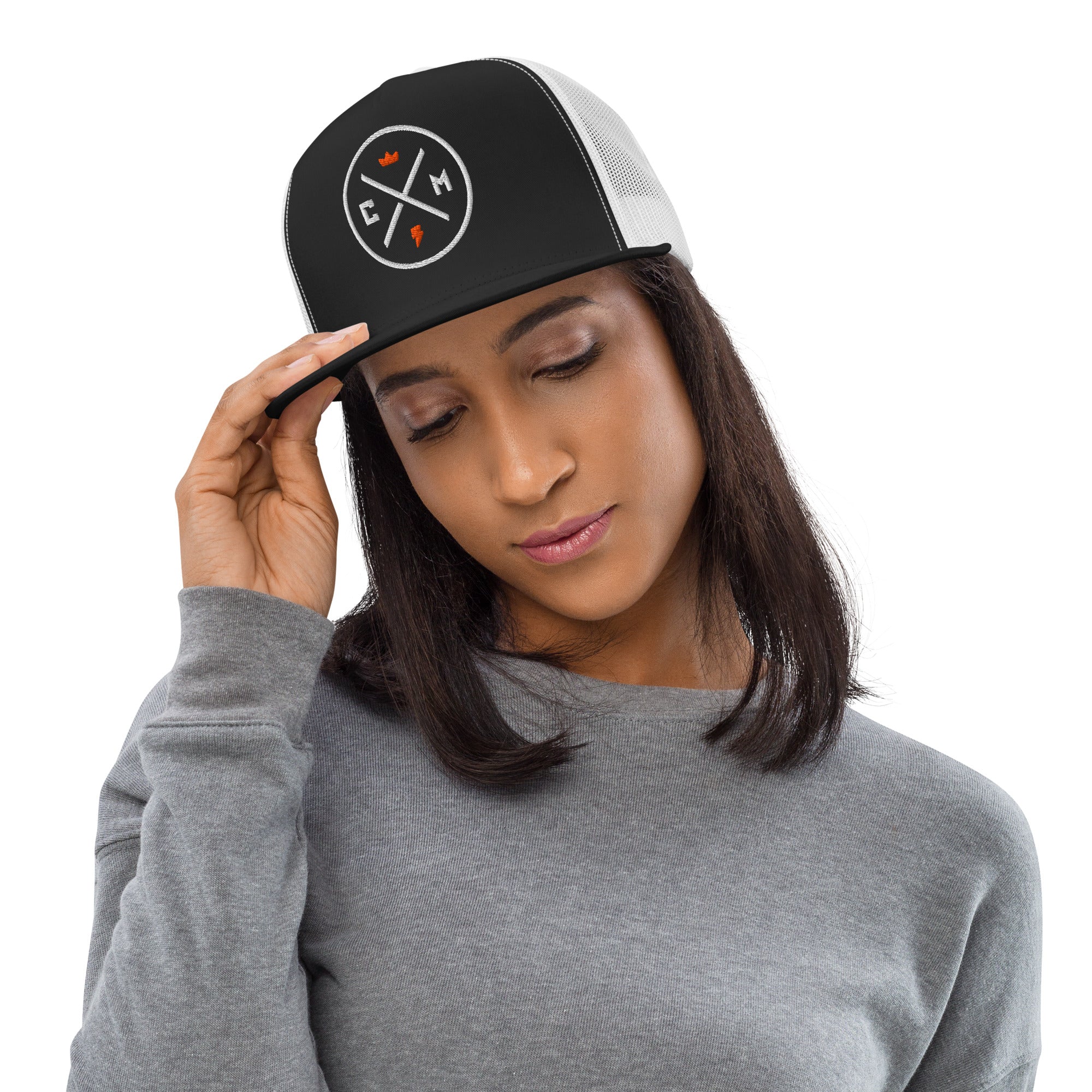 Woman wearing a Crown Moto Legend Embroidered Trucker Hat