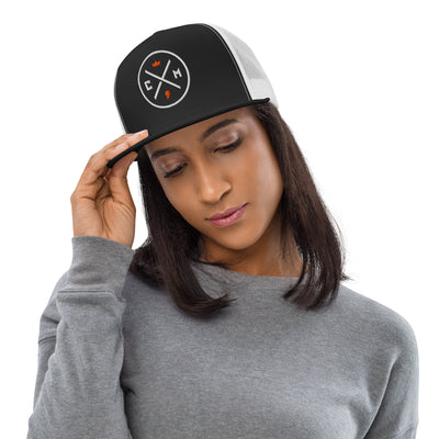 Woman wearing a Crown Moto Legend Embroidered Trucker Hat