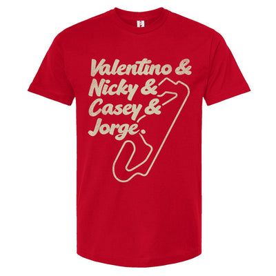 A crewneck t-shirt with text and a graphic design in a cream color. The text lists 'Valentino & Nicky & Casey & Jorge' with a stylized representation of a motorcycle track beneath it.