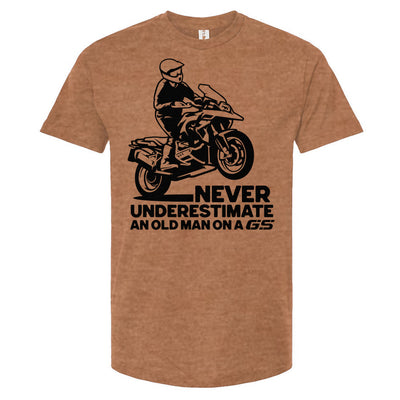 T-shirt with a man wheelie on a GS motorcycle sitting proudly with text below saying "never underestimate an old man on a gs"