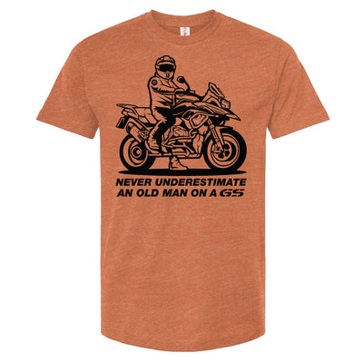 T-shirt with a man on a GS motorcycle sitting proudly with text below saying "never underestimate an old man on a gs"