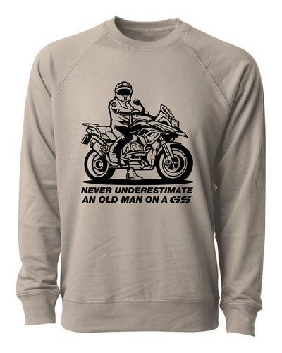 crewneck sweatshirt with an graphic print of a man on a motorcycle and the text 'NEVER UNDERESTIMATE AN OLD MAN ON A GS'.