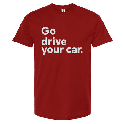 'Go drive your car' text in white on chest of cardinal unisex t-shirt