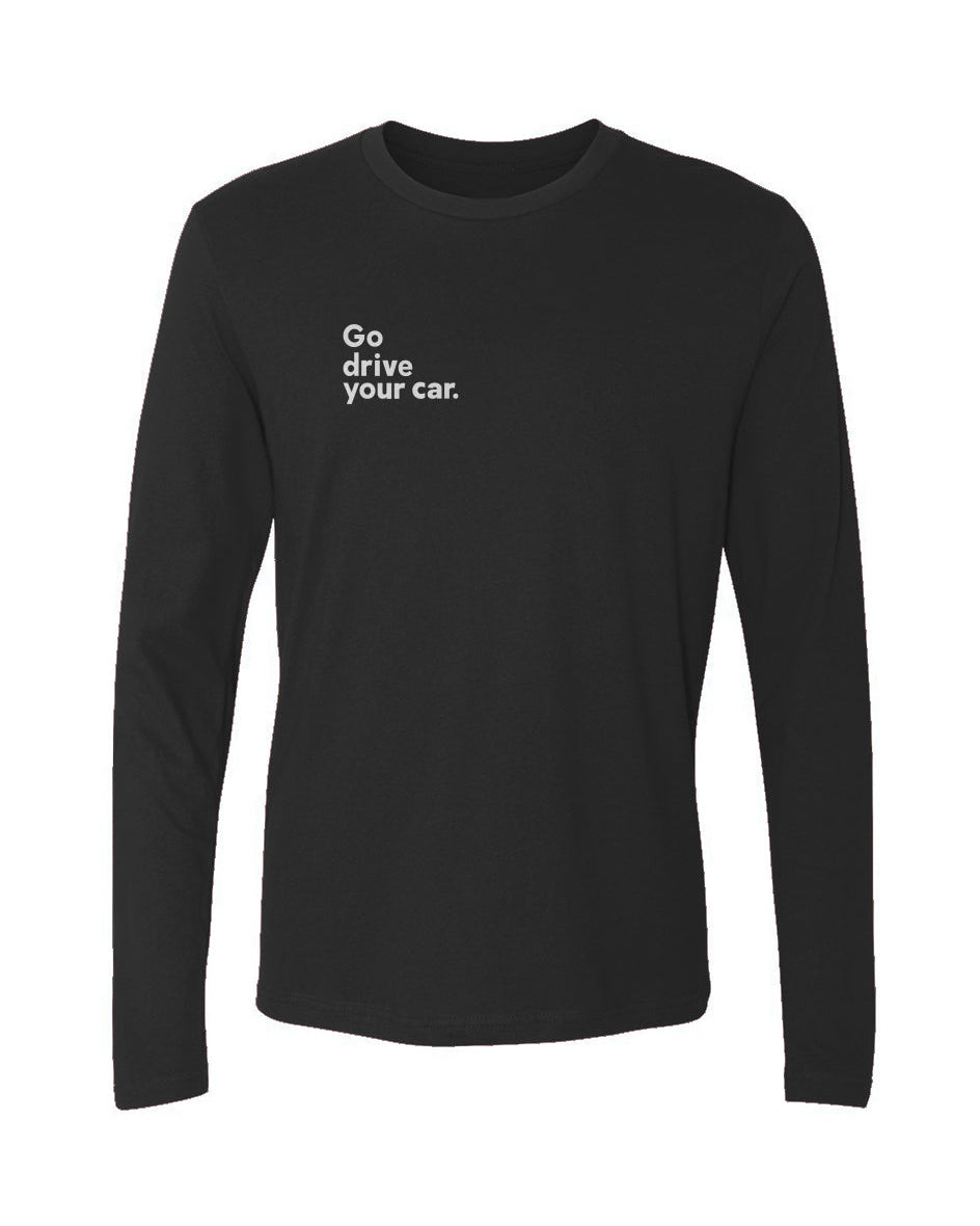 Black long-sleeve shirt with white "Go drive your car" text on right side of chest