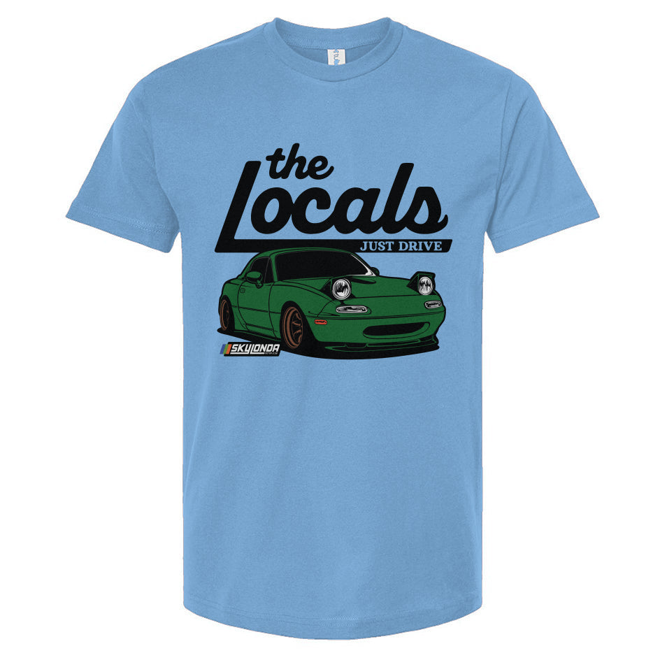 Light blue t-shirt with a green Mazda Miata graphic and 'the Locals' text on a white background