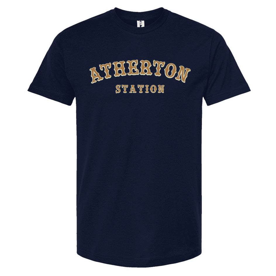 navy blue t-shirt with 'Atherton Station' in gold and cream on the chest