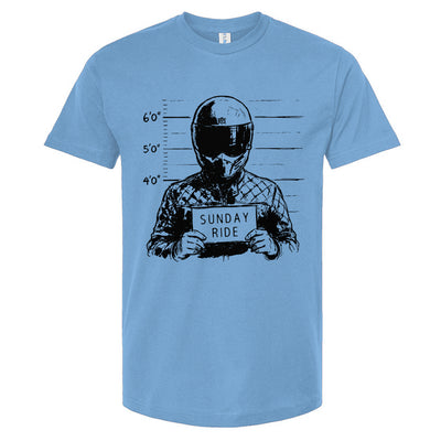 Light blue t-shirt with a graphic design of a person in a helmet and 'Sunday Ride' text on a white background.