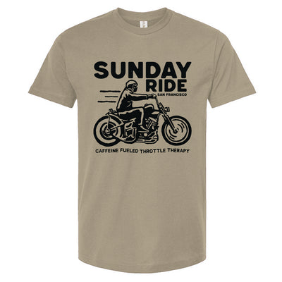 Sand colored t-shirt with black 'Sunday Ride' graphic and text on a white background