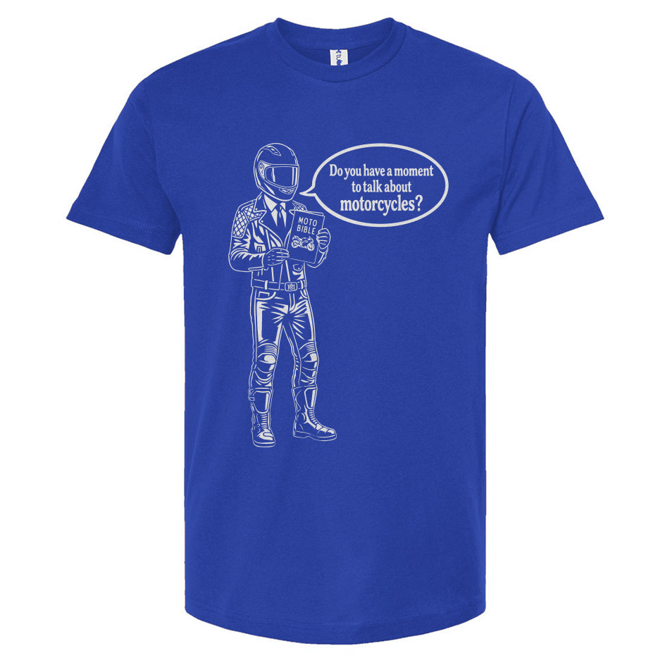 Blue t-shirt with a graphic of a person in a motorcycle helmet and text bubble on a white background