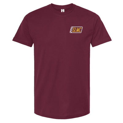 Burgundy t-shirt with a small logo on the chest against a white background