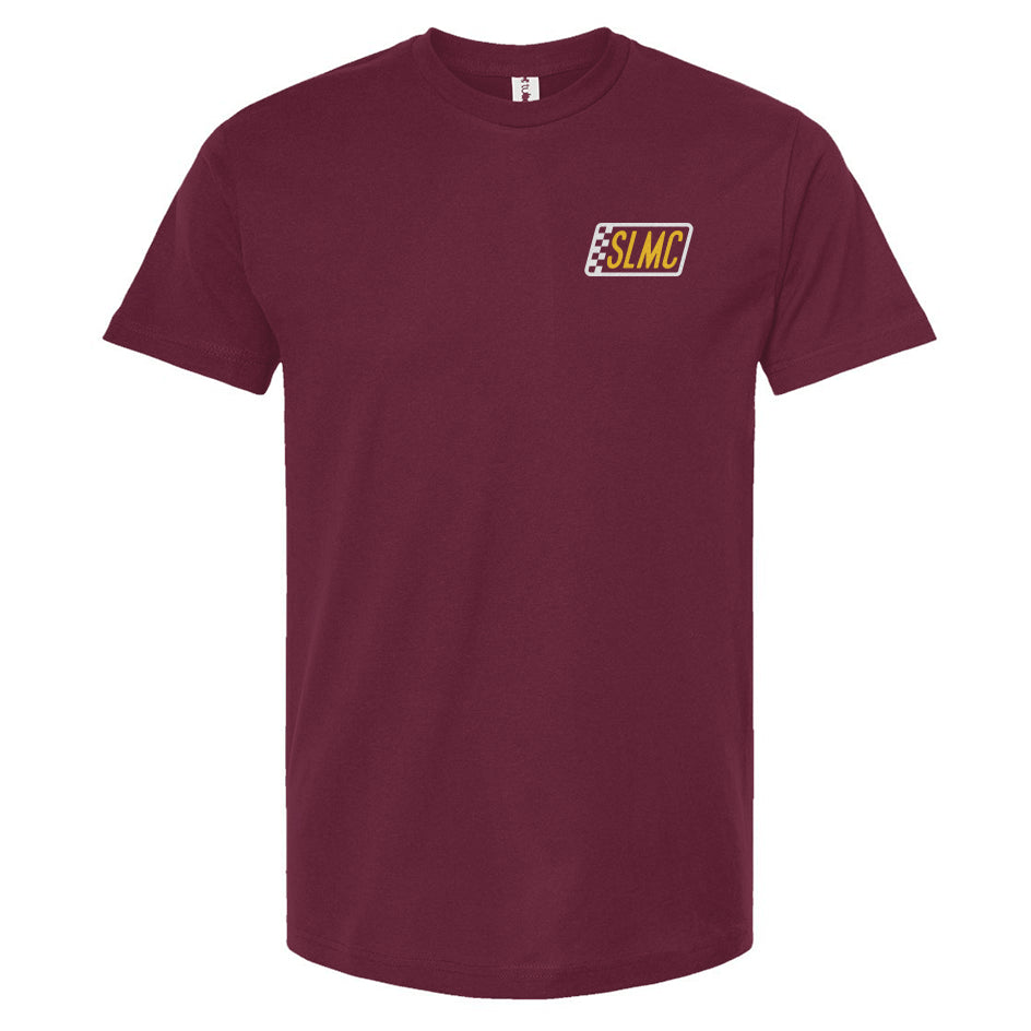 Burgundy t-shirt with a small logo on the chest against a white background